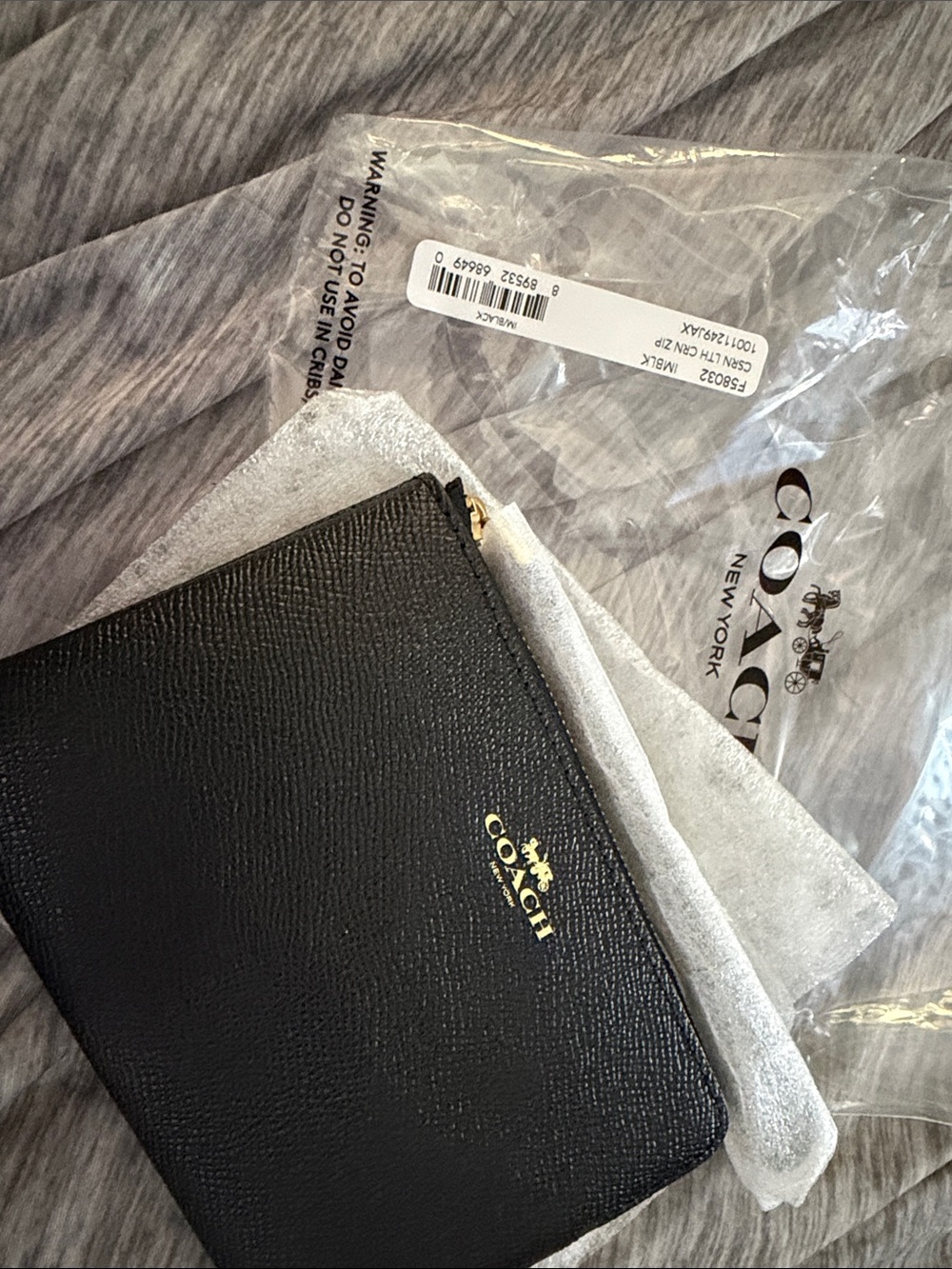 Coach Black Leather Zip Pouch with Gold Logo Accent